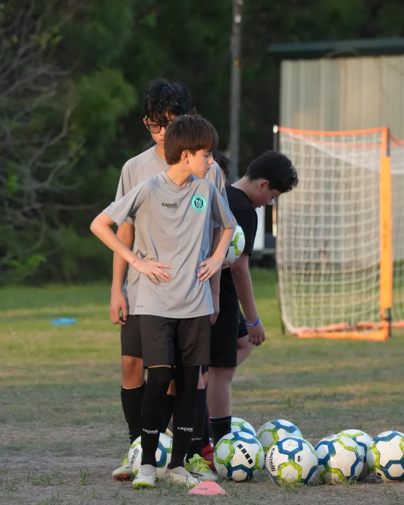 NEXO FC players lined up at training