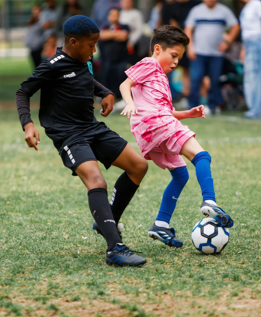 NEXO player dribbling past a defender